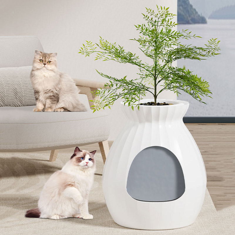 Bac à litière caché pour chat avec plantes artificielles